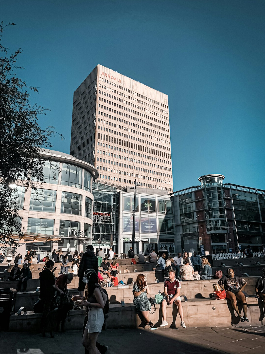 people waiting in city square