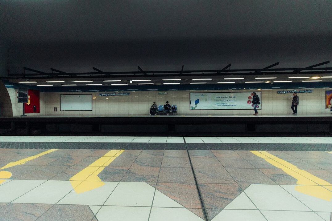 people waiting at subway station