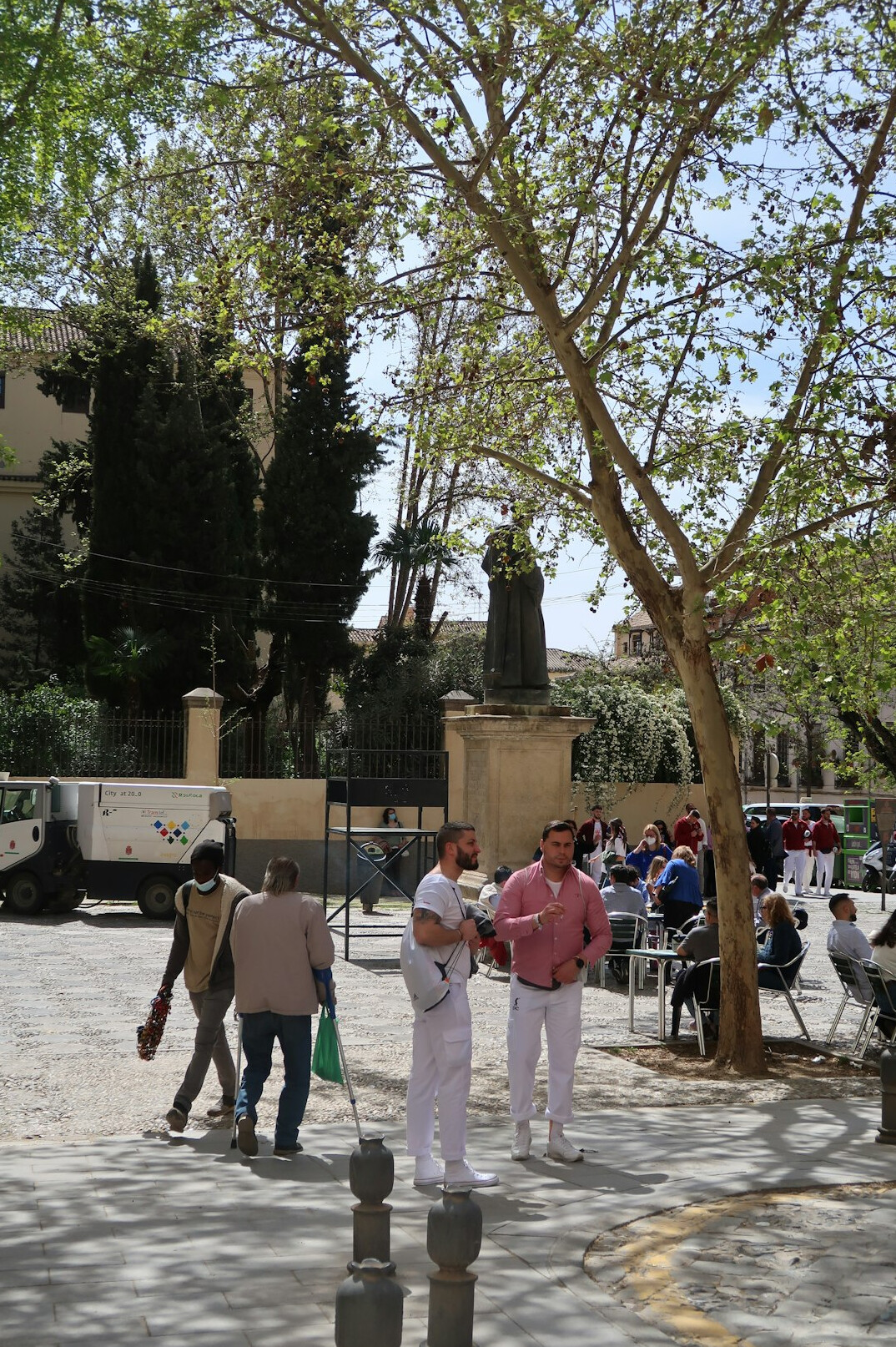 people sitting in city square